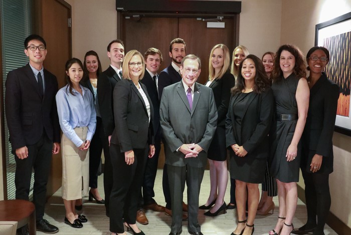 Group of interns pictured with Centene CEO Michael Neidorff