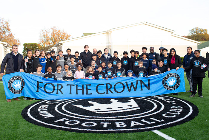 New soccer field opening ceremony group photo in Hunters Pointe.